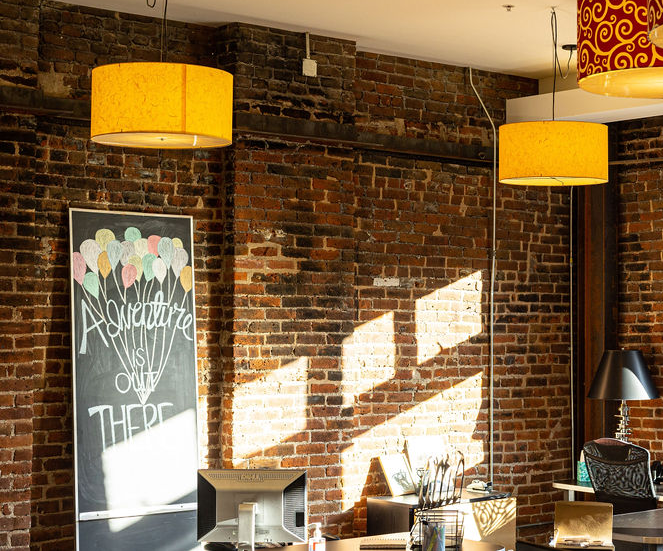 Denver office, brick wall with sunlight