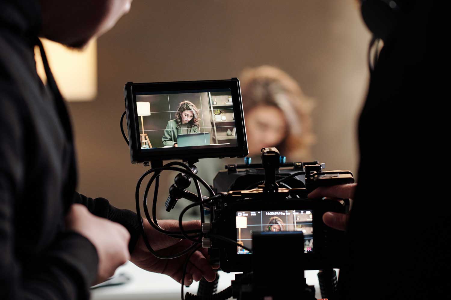 Close up of steadicam screens with female model